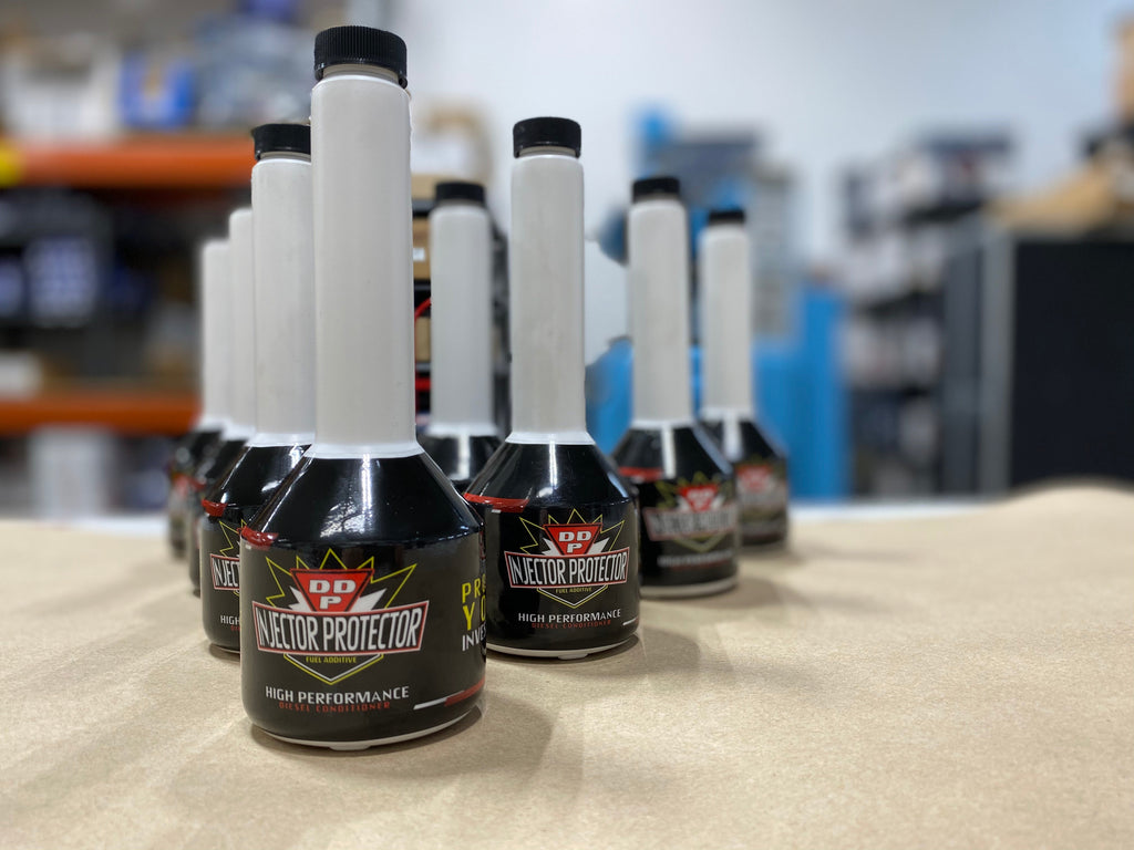 DDP Injector Protector high performance diesel conditioner fuel additive bottles